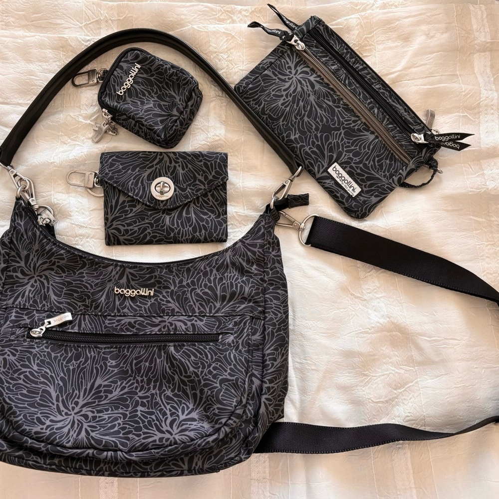 4 -piece set handbag, card wallet, wristlet and small clip on accessories pouch.